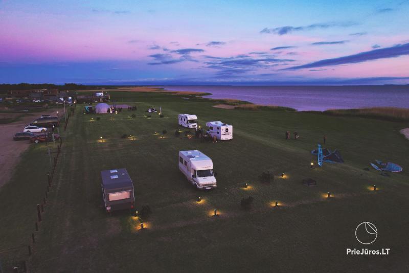 Fenas Kite Spot camping on the shore of the lagoom, in Lithuania, in Svencele