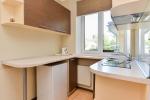 Two-bedroom quadruple apartment with kitchen, separate entrance from the yard and mini courtyard