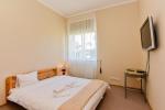 Two-bedroom quadruple apartment with kitchen, separate entrance from the yard