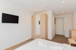 Standard double rooms with refrigerators, electric stoves, showers and WC