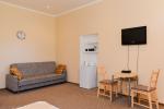 Double rooms with refrigerators, electric stoves, showers and WC and separate entrances from the yard